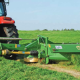 tractor mowing grass silage